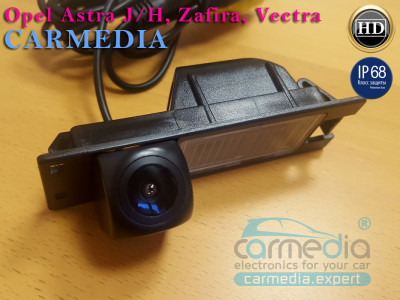 Opel Vectra C, Astra H, Zafira B, Astra J, Insignia CarMedia CM-7239K CCD-sensor Night Vision (ночная съёмка) с линиями разметки (Линза-Стекло широкоугольная) Цветная штатная камера заднего вида вместо плафона подсветки номера