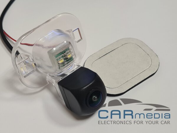 KIA Forte, Cerato (2009-2012), Venga (2010-) / Hyundai Solaris sedan (2010-2016) / Toyota Corolla (2011-2012) (в планку над номером с сохранением штатного плафона подсветки номера) CarMedia ZF-7112HLED-1080P25HZ Цветная штатная камера заднего вида AHD1080