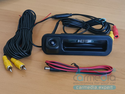 Ford Focus 3 (2011-2017) дорестайл, Focus 3 (2015-2017) CARMEDIA CM-8010-FF3 Night Vision (ночная съёмка) с линиями разметки (Линза-Стекло) цветная штатная камера заднего вида в ручку открывания багажника