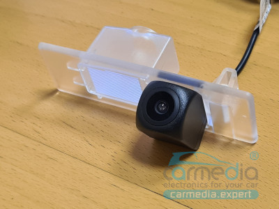 Kia Sportage 4 (с 2016г.в. по 2020г.в.) CarMedia CM-7244K CCD-sensor Night Vision (ночная съёмка) с линиями разметки (Линза-Стекло) Цветная штатная камера заднего вида вместо плафона подсветки номера