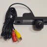 Chevrolet Aveo (2004-2011), Captiva (2006-), Cruze (2008-), Epica (2006-), Orlando (2010-), Lacetti (2006-), Daewoo CARMEDIA ZF-7234HB-1080P25HZ Цветная штатная камера заднего вида AHD1080P25HZ-CVBS для автомобилей в планку над номером