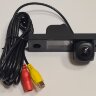 Chevrolet Aveo (2004-2011), Captiva (2006-), Cruze (2008-), Epica (2006-), Orlando (2010-), Lacetti (2006-), Daewoo CARMEDIA ZF-7234HB-1080P25HZ Цветная штатная камера заднего вида AHD1080P25HZ-CVBS для автомобилей в планку над номером